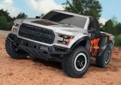 Traxxas 2017 Ford Raptor RTR Slash 1/10 2WD Truck W/TQ 2.4GHz Radio, Battery & DC Charger (FOX) -RC Cars & Trucks Sales 58094 1 3qtr Front Fox Raptor outside 82848.1562090819