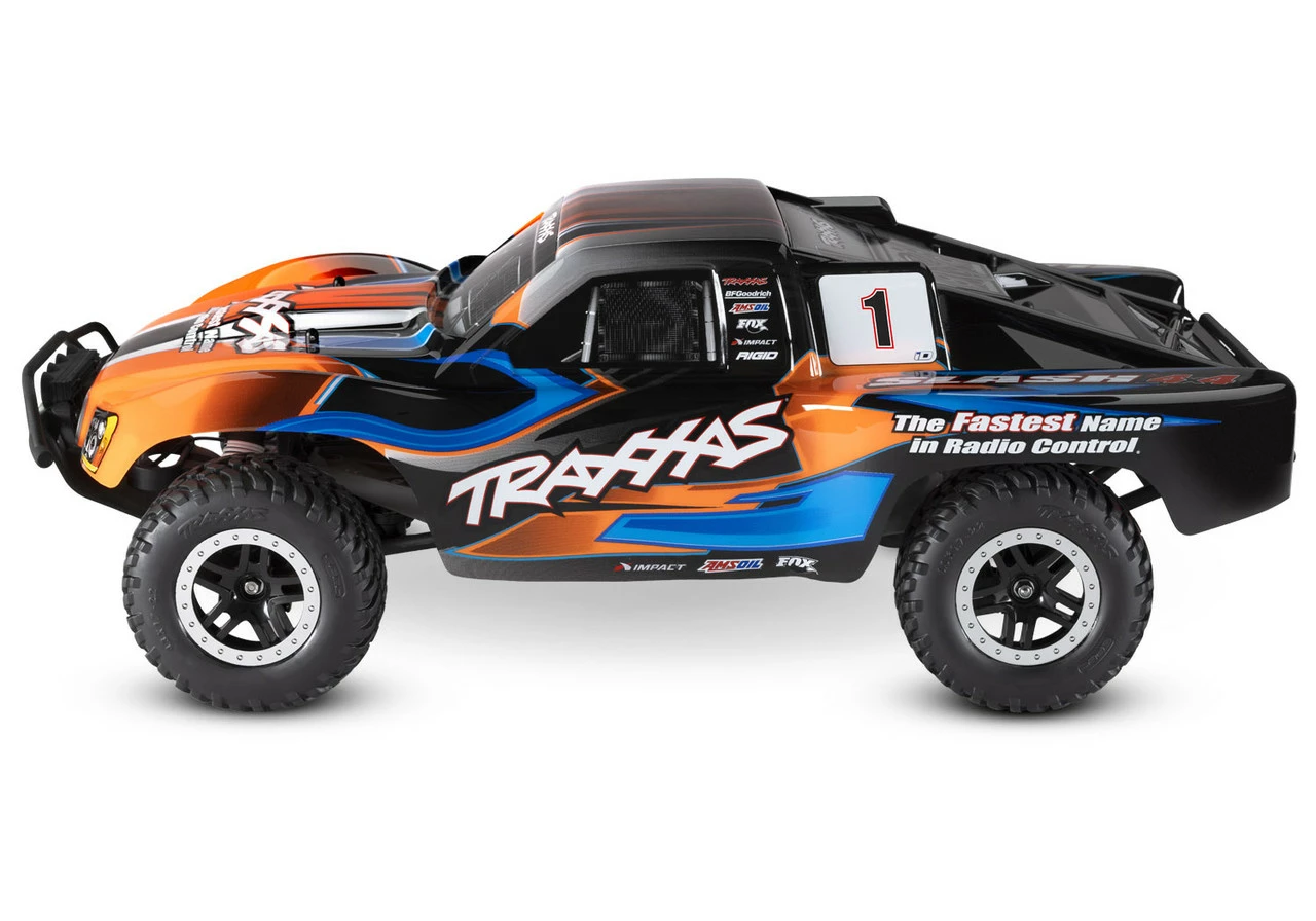 Traxxas Slash 4X4 RTR 4WD Brushed Short Course Truck With DC Charger/battery, LED Lighting (Orange) 4 Traxxas Slash 4X4 RTR 4WD Brushed Short Course Truck With DC Charger/battery, LED Lighting (Orange) - Image 2