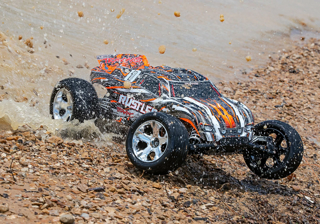 Traxxas Rustler 1/10 RTR Stadium Truck W/XL-5 ESC, TQ 2.4GHz Radio, Battery & DC Charger (Orange) 8 Traxxas Rustler 1/10 RTR Stadium Truck W/XL-5 ESC, TQ 2.4GHz Radio, Battery & DC Charger (Orange) - Image 6
