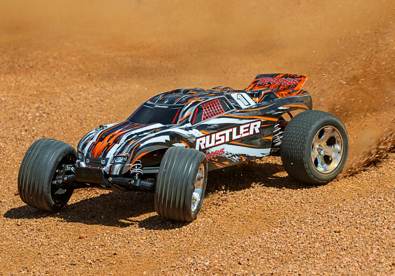Traxxas Rustler 1/10 RTR Stadium Truck W/XL-5 ESC, TQ 2.4GHz Radio, Battery & DC Charger (Orange) 9 Traxxas Rustler 1/10 RTR Stadium Truck W/XL-5 ESC, TQ 2.4GHz Radio, Battery & DC Charger (Orange) - Image 7