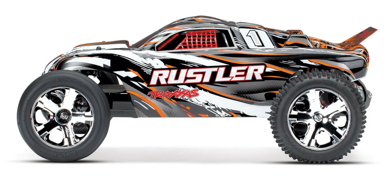 Traxxas Rustler 1/10 RTR Stadium Truck W/XL-5 ESC, TQ 2.4GHz Radio, Battery & DC Charger (Orange) 4 Traxxas Rustler 1/10 RTR Stadium Truck W/XL-5 ESC, TQ 2.4GHz Radio, Battery & DC Charger (Orange) - Image 2