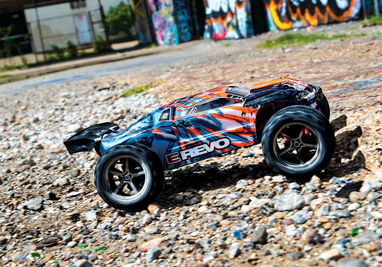 Traxxas E-Revo 1/16 4WD Brushed RTR Truck (Orange) W/2.4GHz Radio, Battery And DC Charger 8 Traxxas E-Revo 1/16 4WD Brushed RTR Truck (Orange) W/2.4GHz Radio, Battery And DC Charger - Image 6